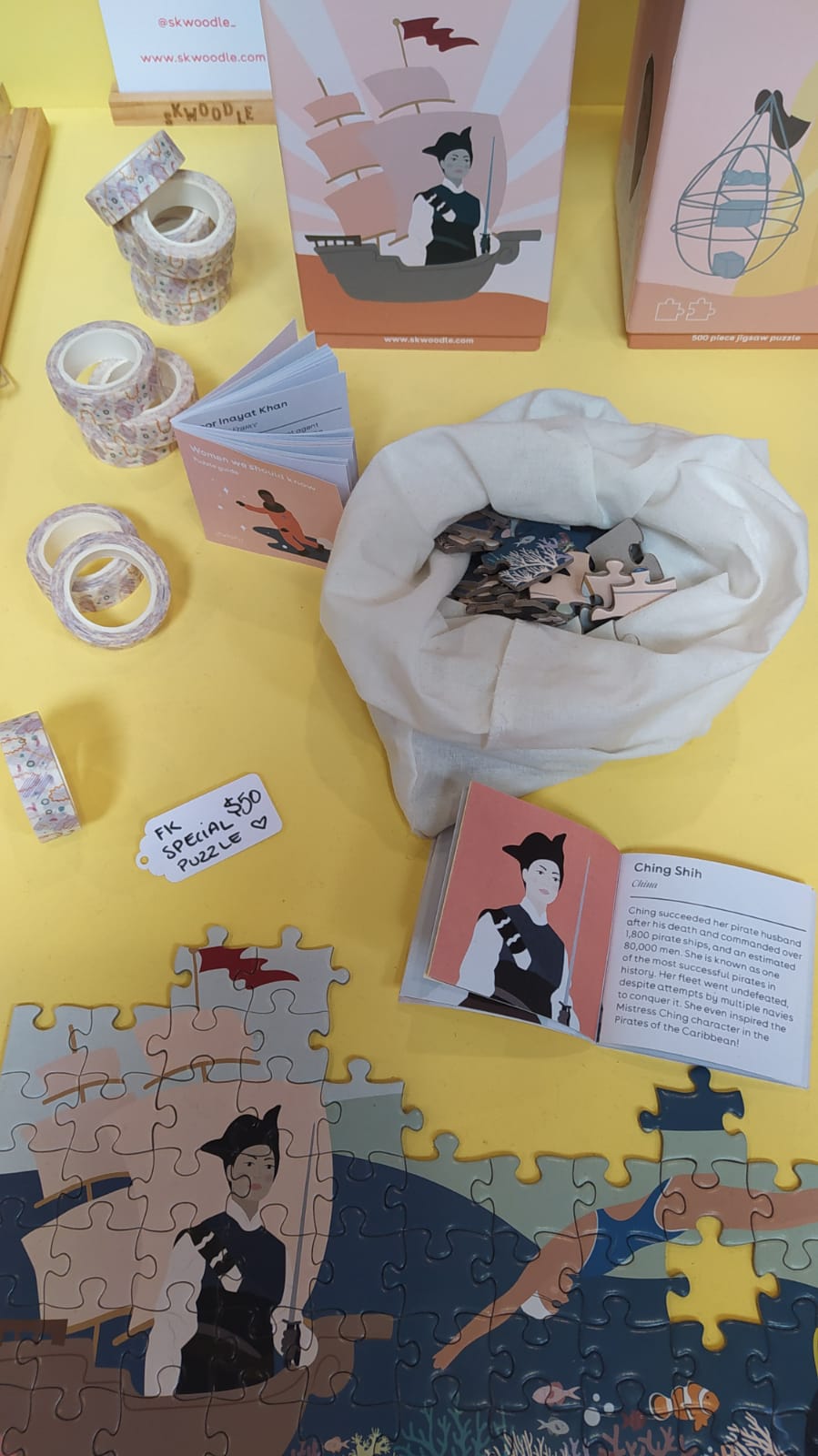 A closeup of the puzzle and washi tapes on the market stall.
